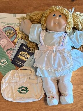Cabbage Patch Kids Blonde Rag Doll with Light Blue Dress and White Apron